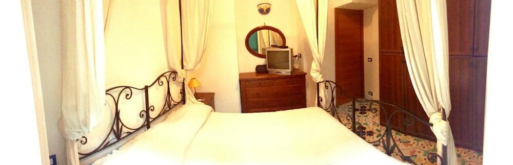 Фото B&b La Bouganville