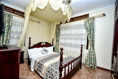 Гостиница ShasHomes в Кампале