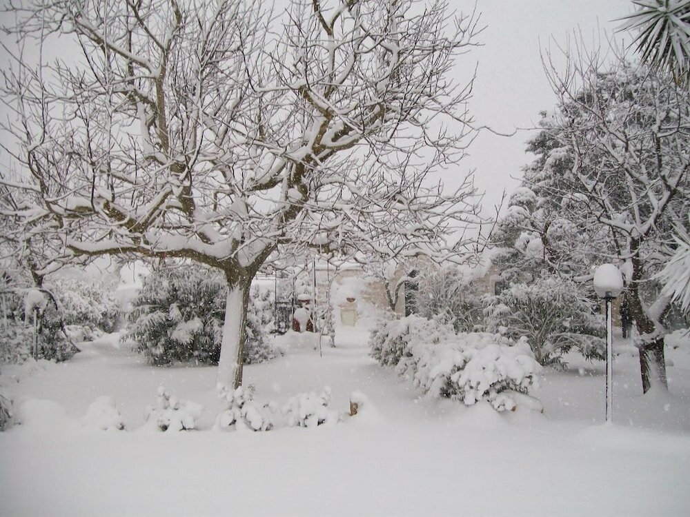 Фото Agriturismo i Trulli di Zio Dino