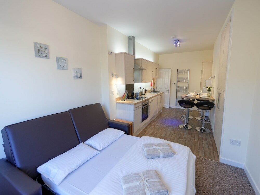 Фото Sea Road Apartments