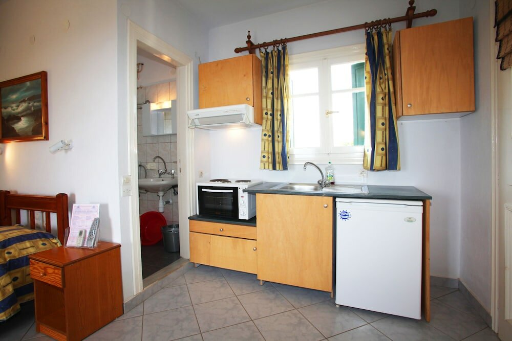 Фото Alexandros Rooms & Studios