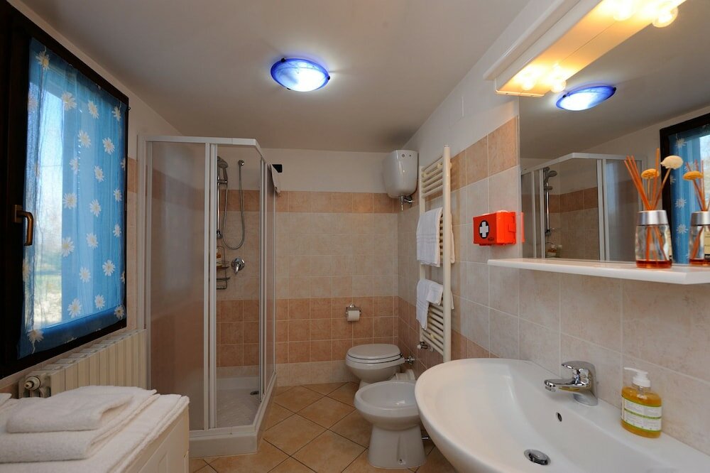 Фото Agriturismo Lustrinu