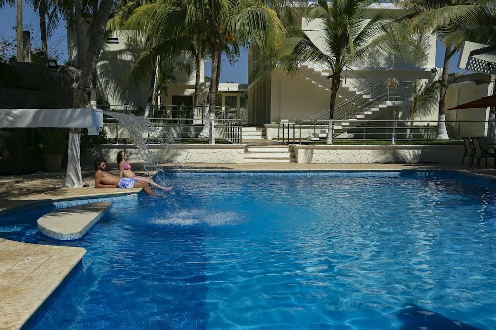 Фото Casa Margarita Hotel And Paradise