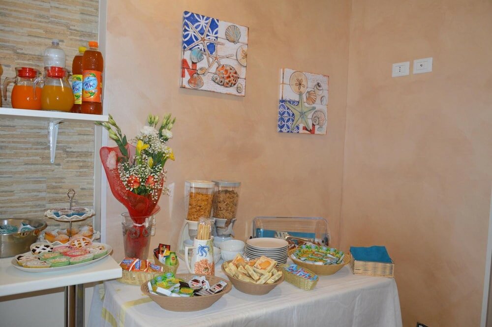 Фото B&b La Conchiglia