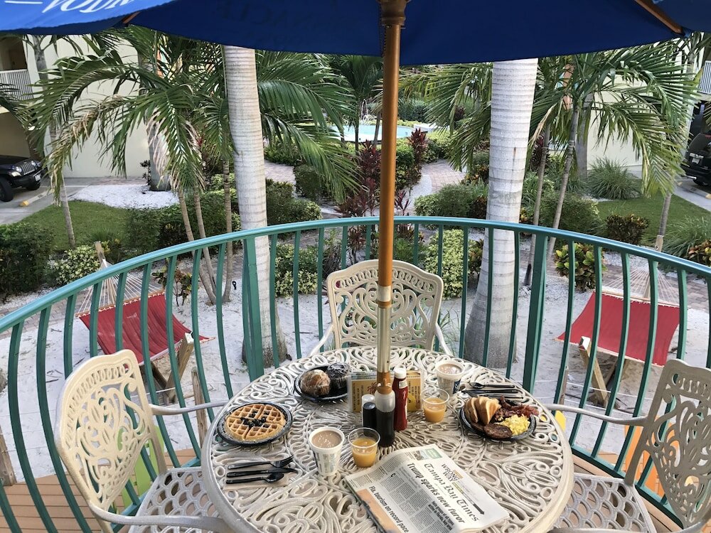 Фото Sunset Vistas Two Bedroom Beachfront Suites