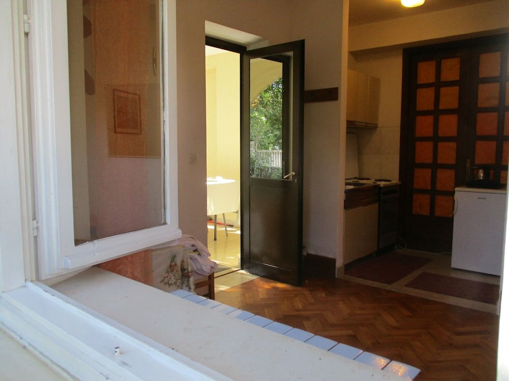 Фото Apartments And Rooms Artemida