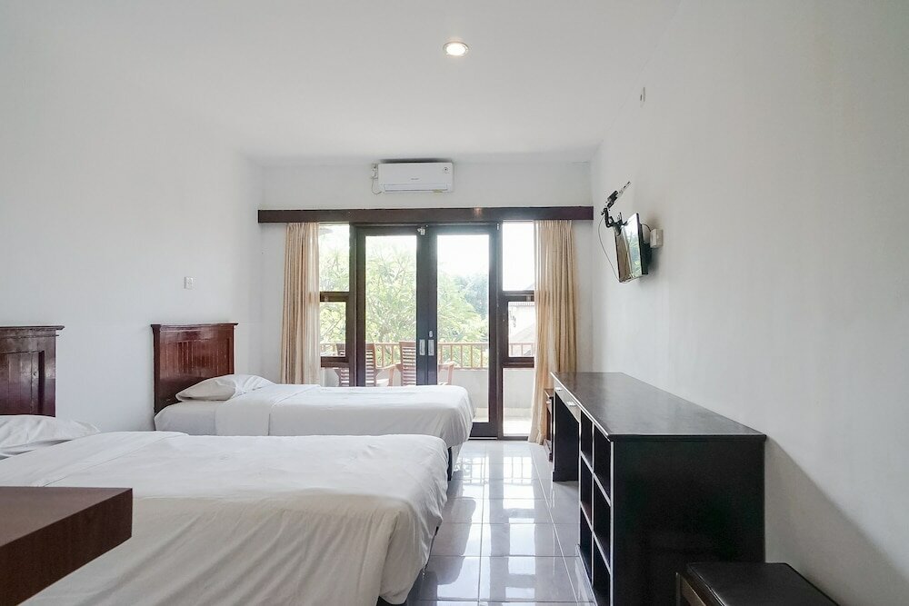 Фото Indopurejoy House - Komala Indah Cottages