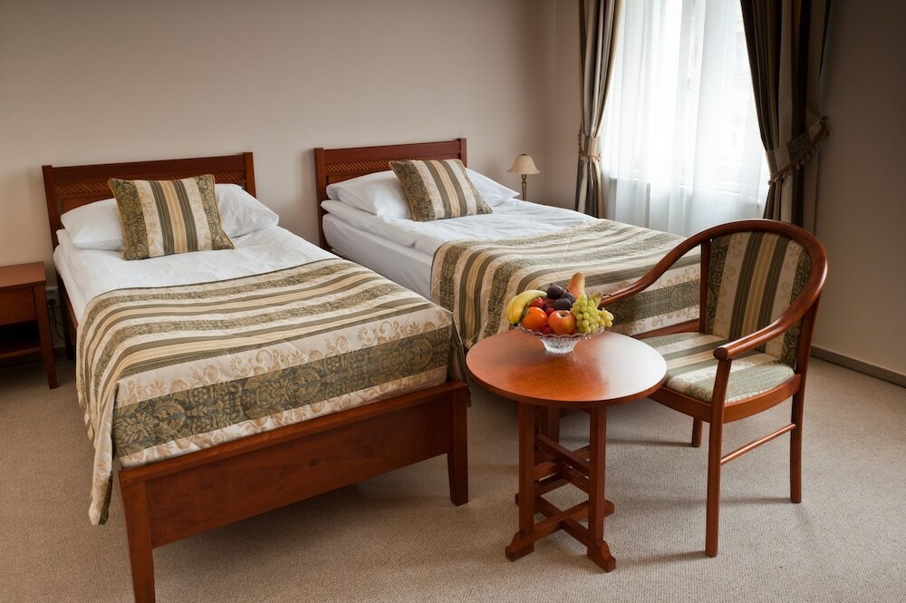 Фото Amigo City Centre Hotel