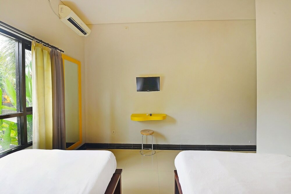 Фото Capital O 91405 Hotel Lavarta