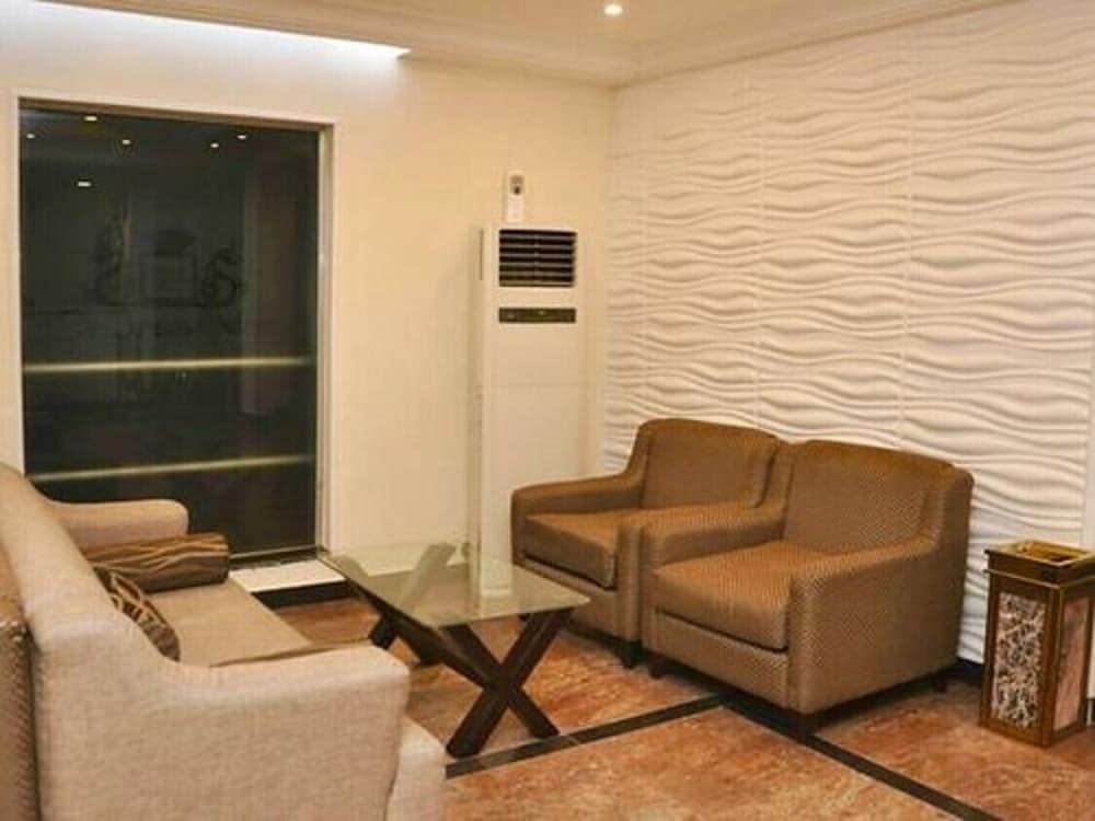 Фото De Brass Suites Hotel