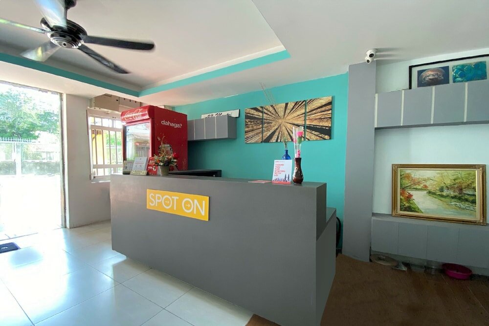 Фото Spot On 90283 27 Muntri