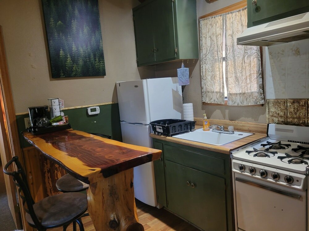 Фото Sleepy Hollow Cabins and Hotel