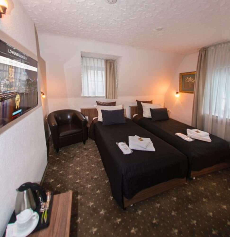 Фото Löwenbräu Köln Hotel & Restaurant