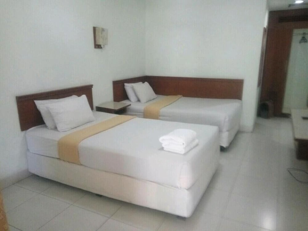 Фото Pandu Lakeside Hotel Parapat - Toba Lake