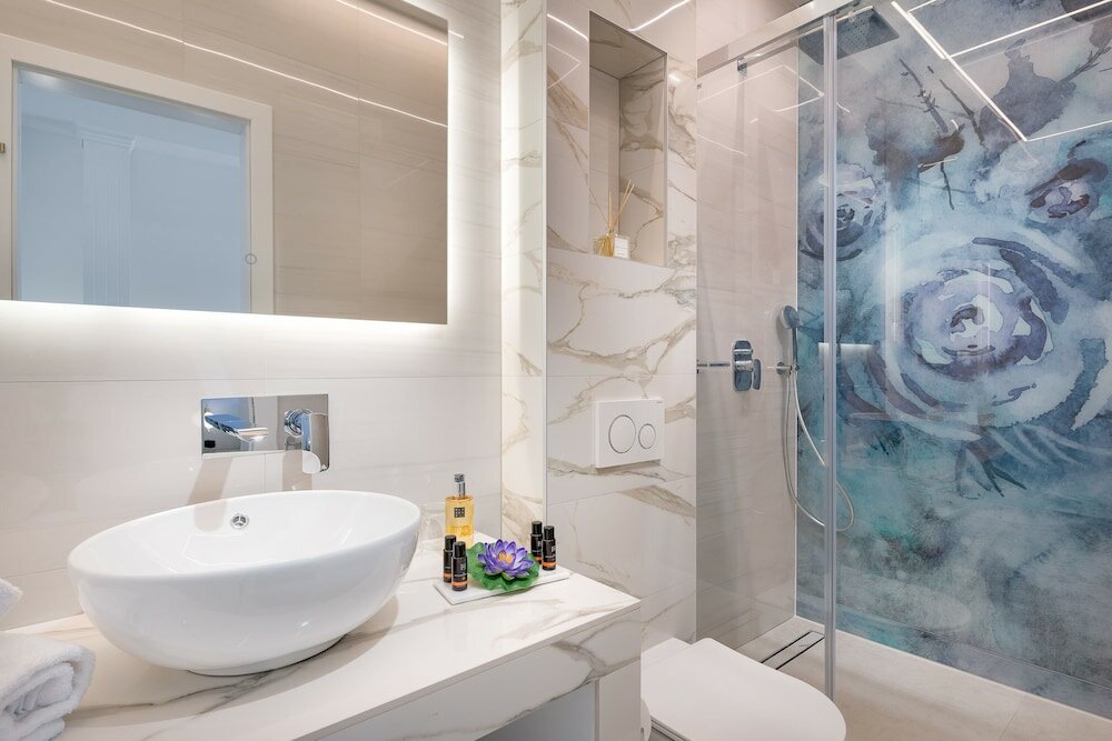 Фото Flos Luxury Rooms