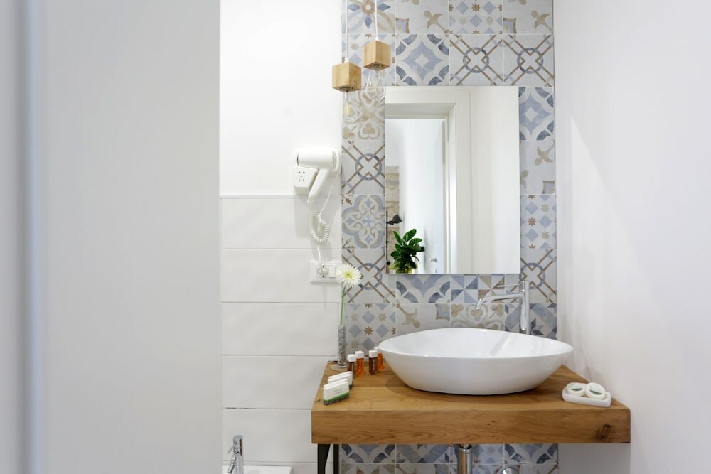 Фото Reusuite Authentic Sicilian Hospitality