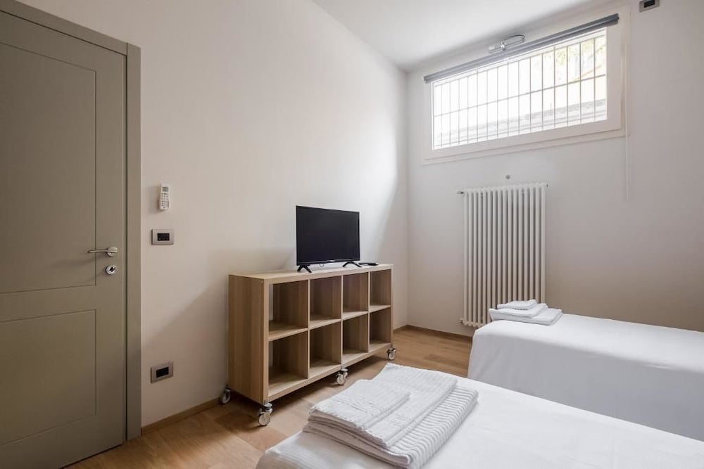 Фото Sant'orsola Suites Apartments