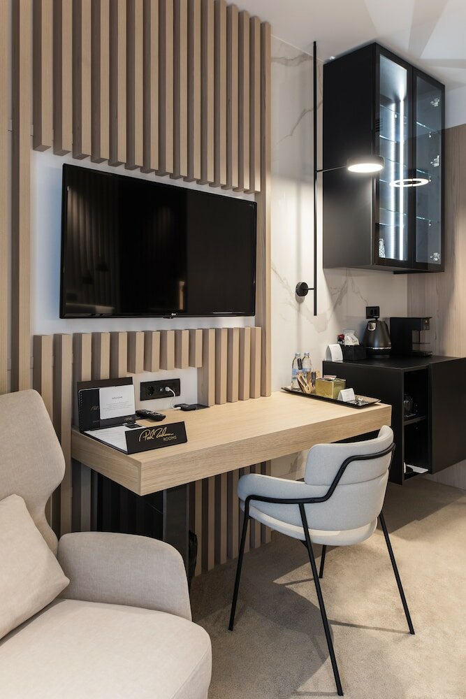 Фото Pod Zidom Rooms