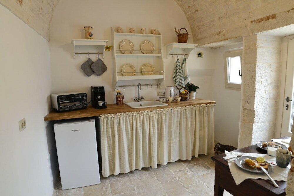 Фото Trulli Lithos Suite