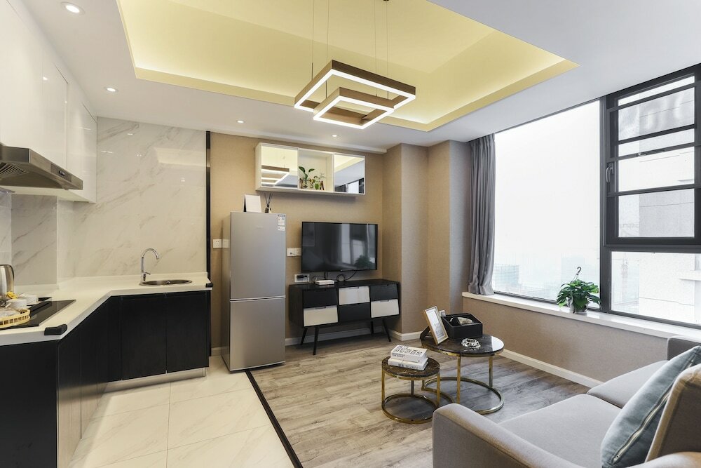 Фото Yue Qi Hotel Apartment