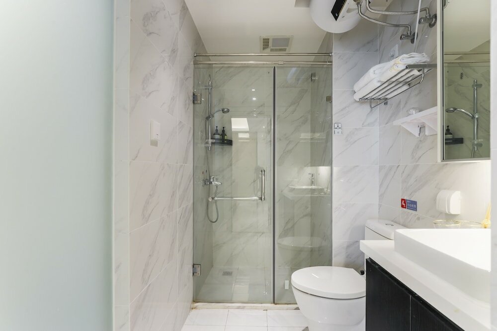 Фото Yue Qi Hotel Apartment