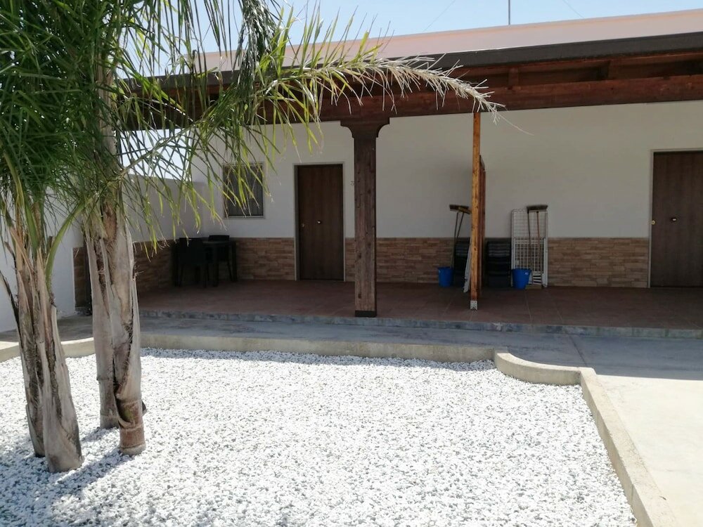 Фото Appartamenti La Caletta