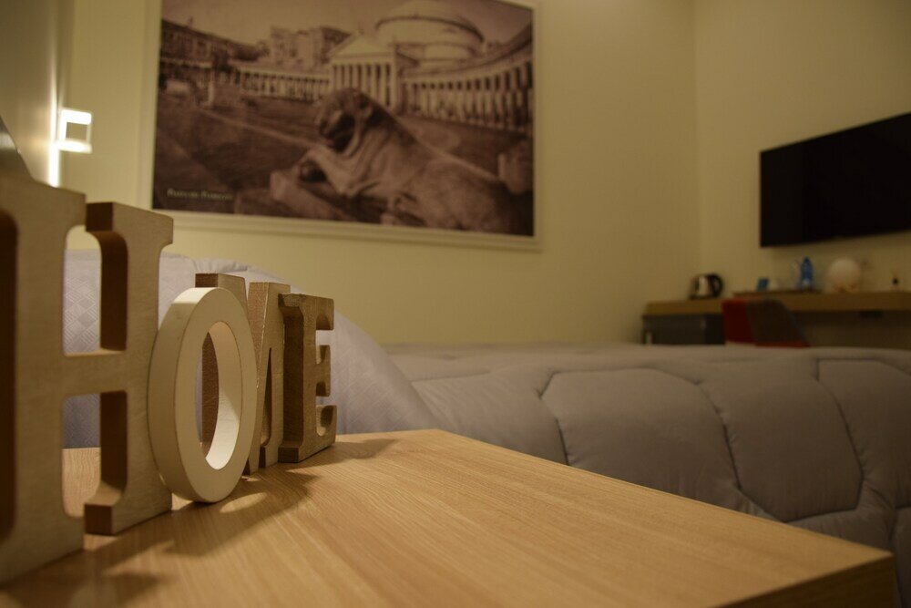 Фото Napoli Squares Suites