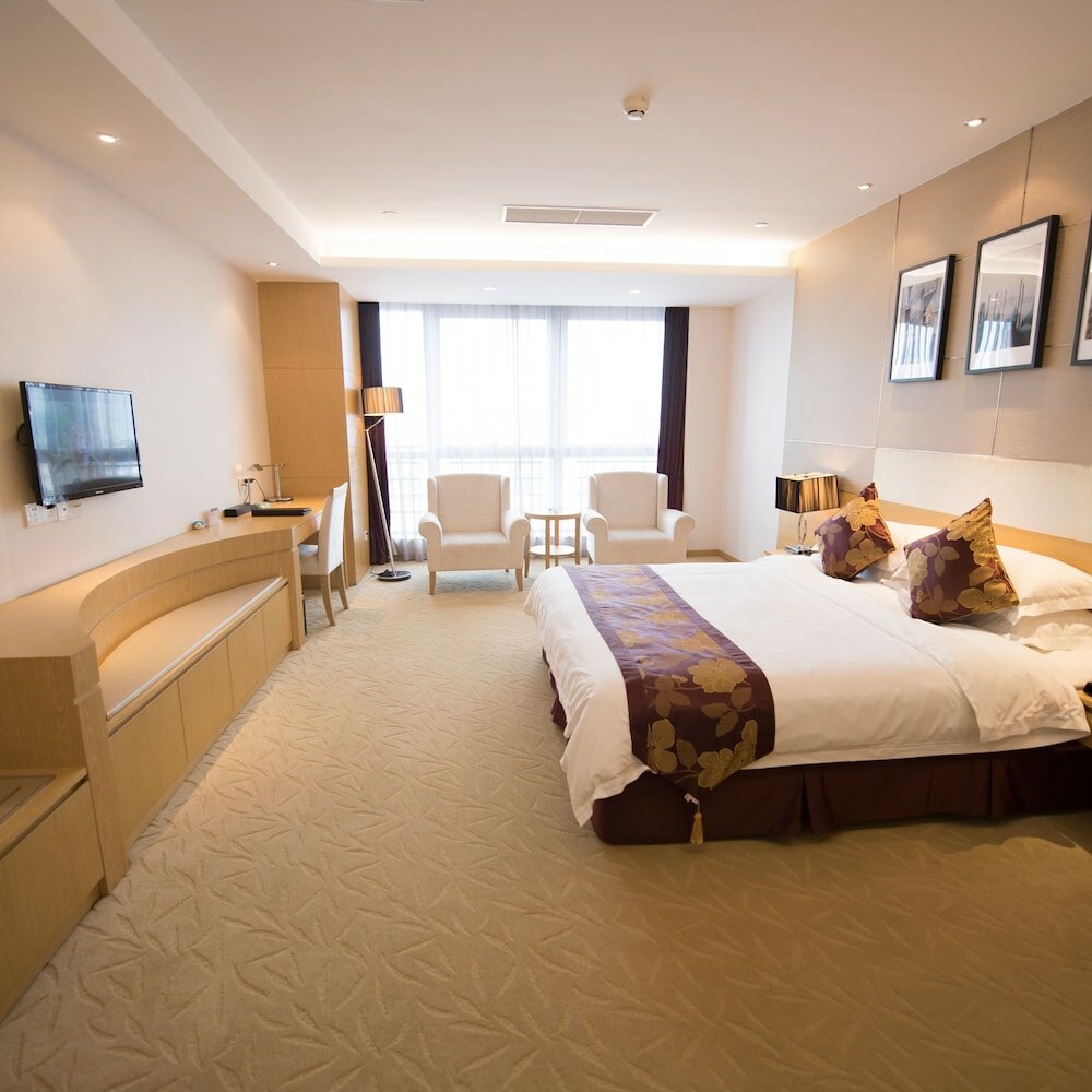 Фото Suzhou Sun Plaza Hotel