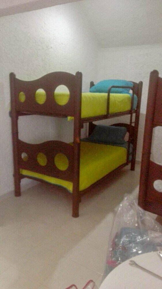 Фото Pok-Ta-Pok Guest House