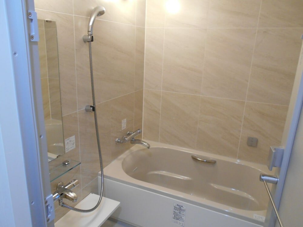 Фото Nishikawaguchi Station Hotel Stay Lounge