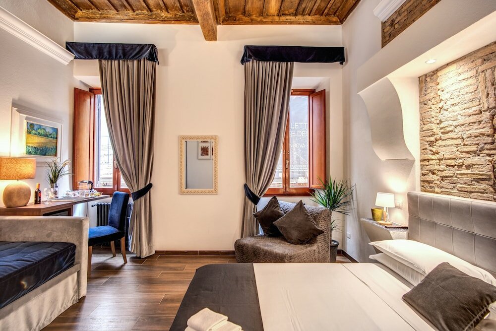 Фото Piazza di Spagna Comfort Rooms