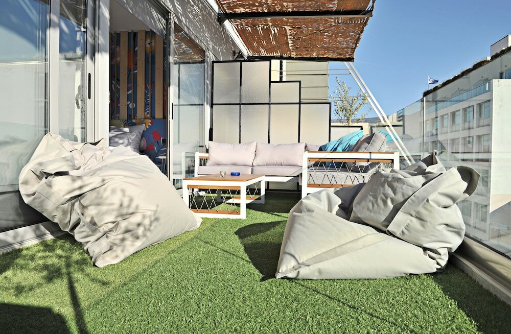 Фото The Athenians Art Apartments