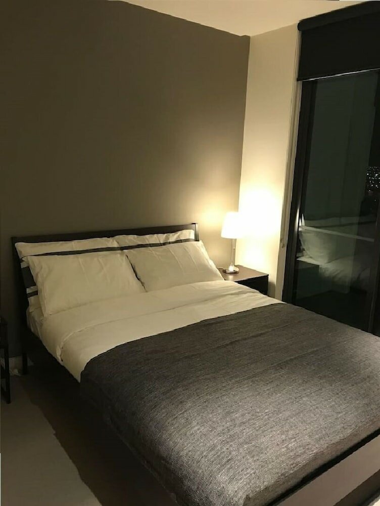 Фото Melbourne Docklands Convesso Seaview Apartment