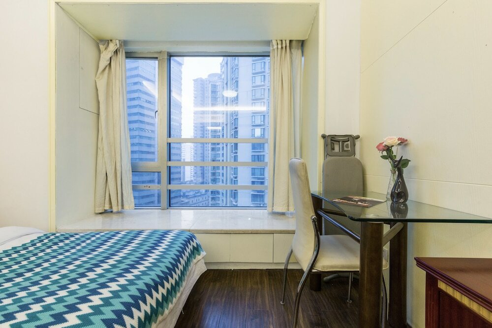 Фото Shanghai Yueyi Apartment Hotel