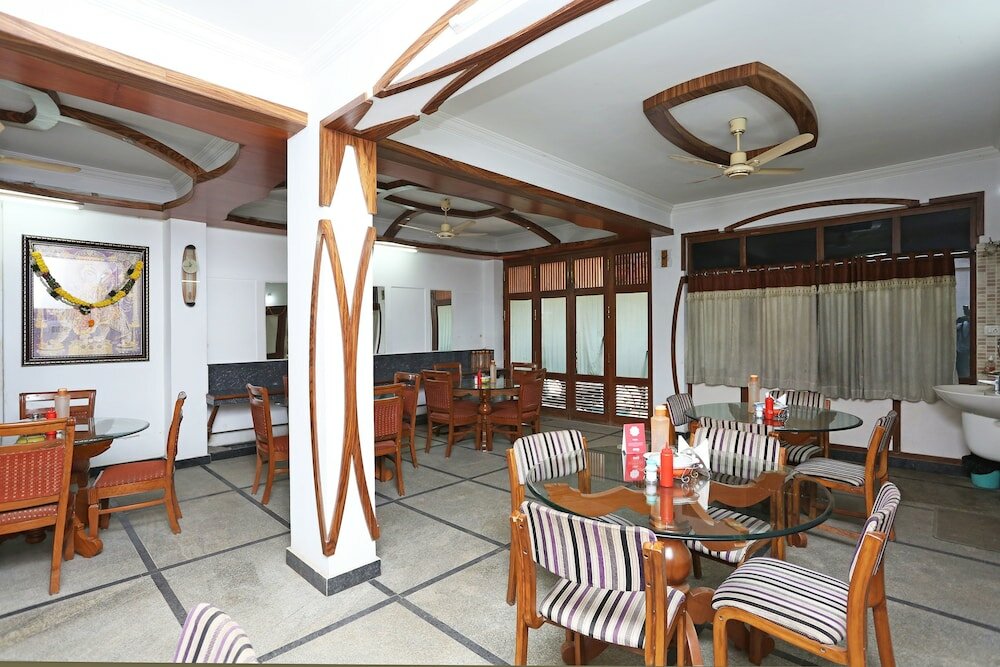 Фото Oyo 8932 Delight Inn Gachibowli