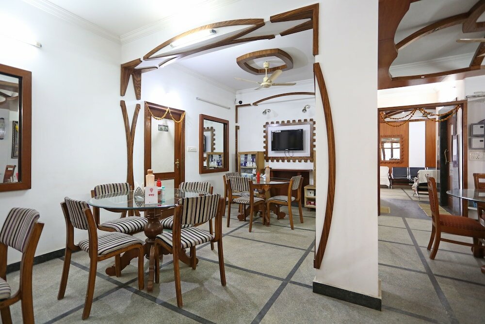 Фото Oyo 8932 Delight Inn Gachibowli