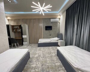 Strong Plaza (Zarafshan, 19-kichik tuman, 30), hotel