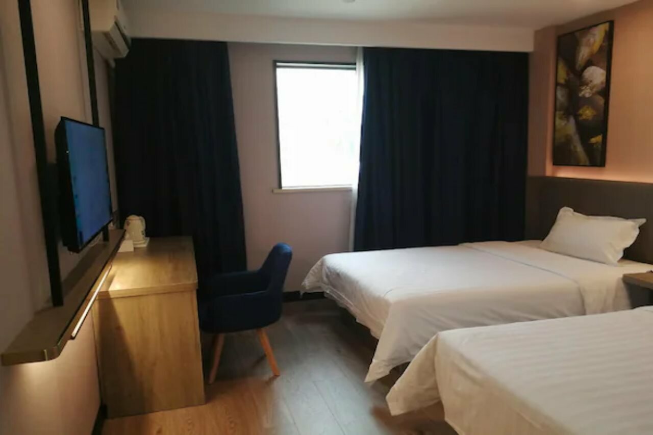 Фото 7 Days Inn Shanghai South Hongmei Road Branch