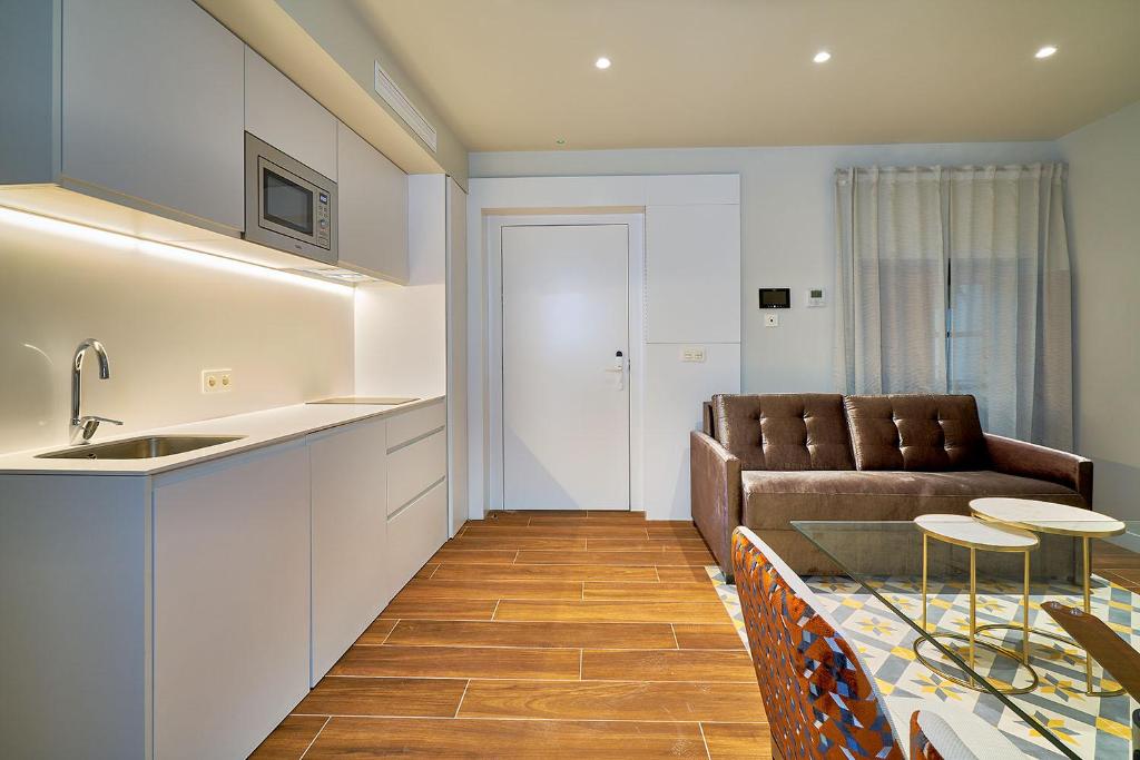 Фото Tandem Torres De Cádiz Suites