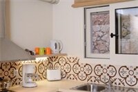 Фото Αksos Suites Accessible Accommodation