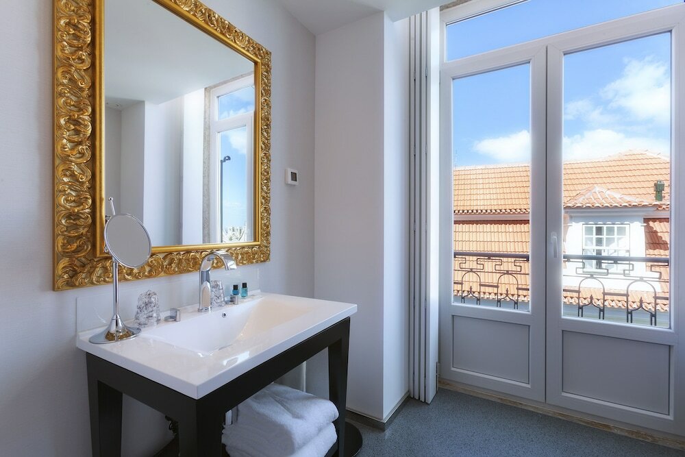 Фото Lisboa Carmo Hotel