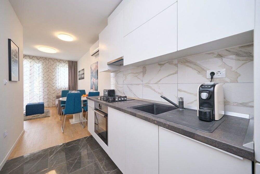 Фото Modern City Apartment