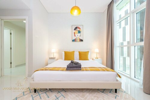 Апартаменты Marco Polo - Colorful Charm with Captivating City Views в Дубае