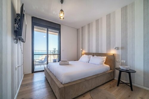 Апартаменты Stylish 1br Beach-Front Apt w Sea View в Хайфе