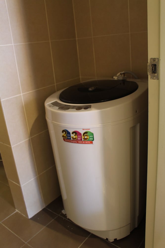 Фото Peaceful Service Suites at Taragon Puteri Bintang