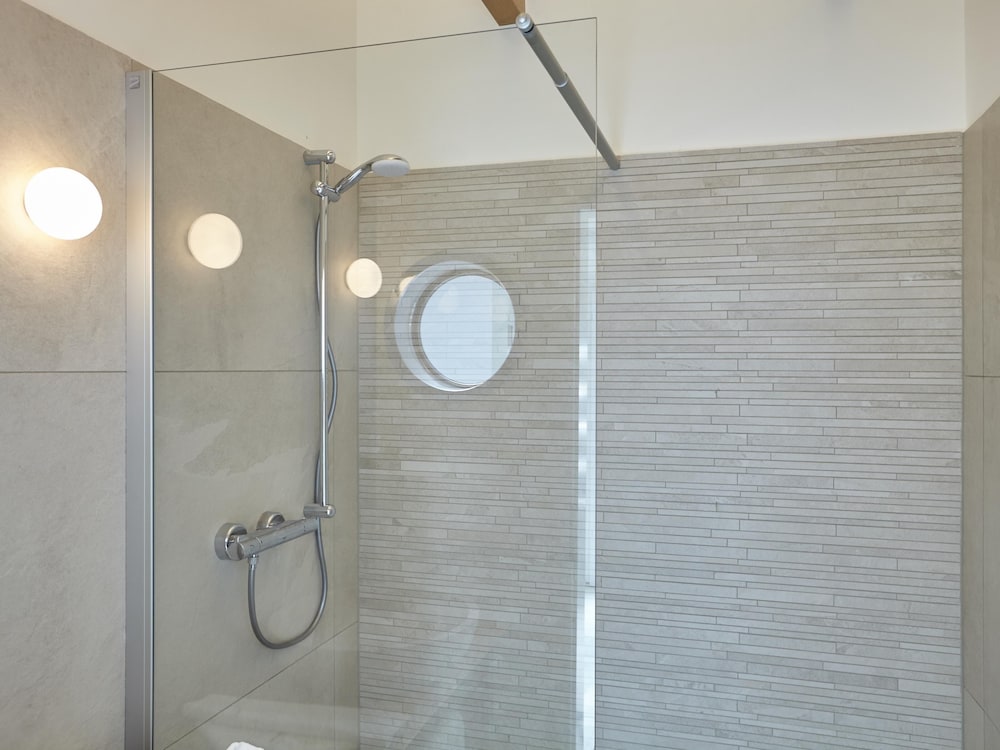 Фото Ferienhaus & Appartments Düneneck 8