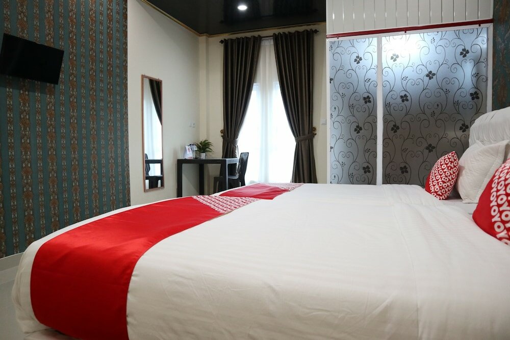 Фото Oyo 1648 Penginapan Three Joye