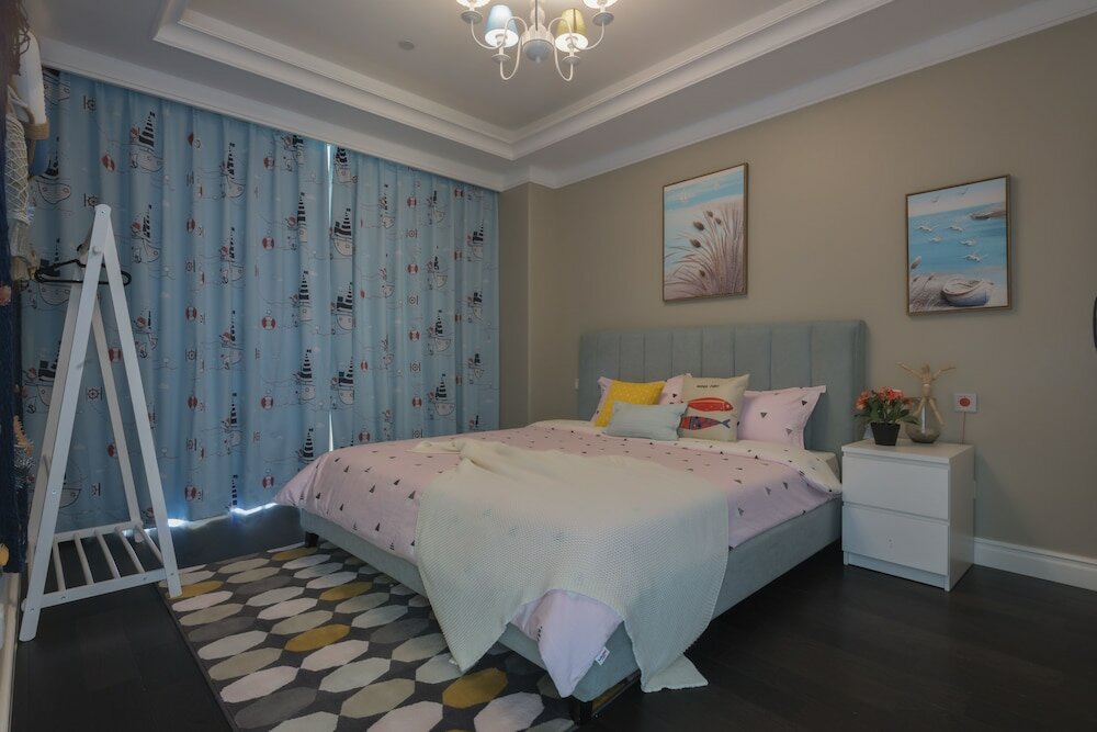 Фото Shanghai Xinchuan Boutique Apartment