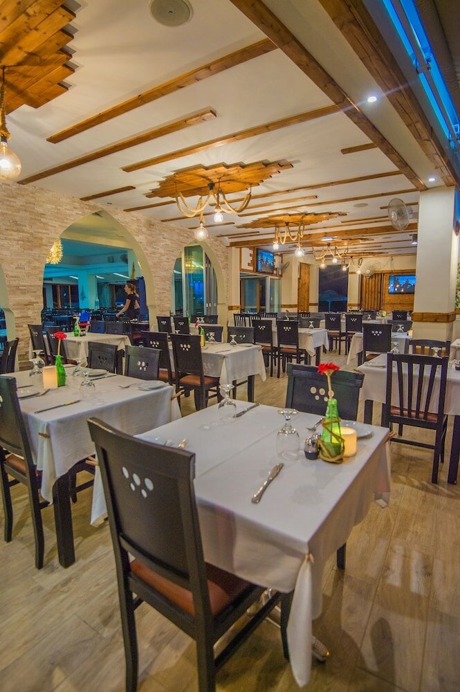 Фото Windmills Hotel Apartments