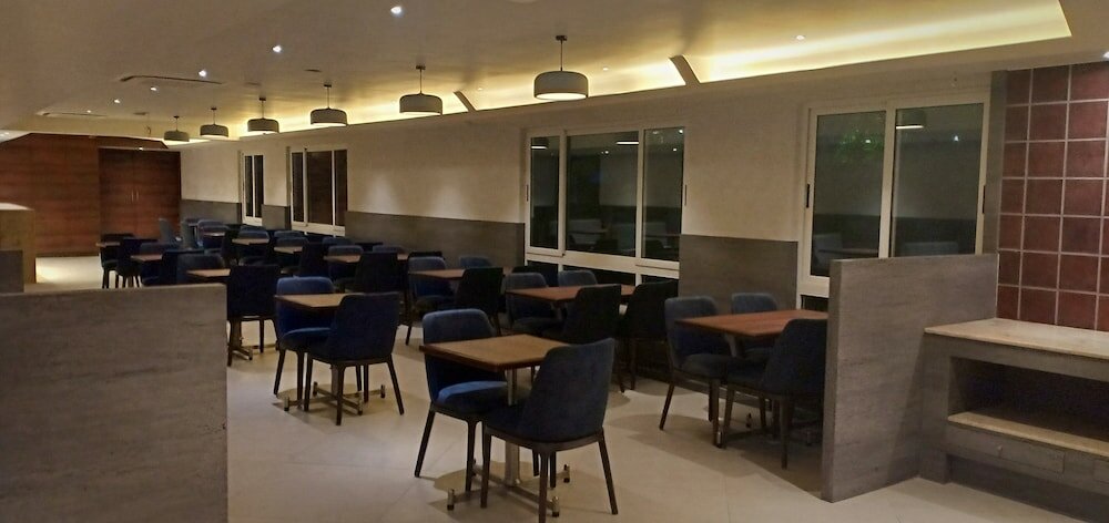 Фото Cosmique Clarks Inn Suites, Goa